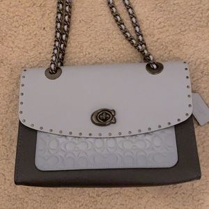 Beautiful like new coach leather python blue handbag. Crossbody or shoulder bag.